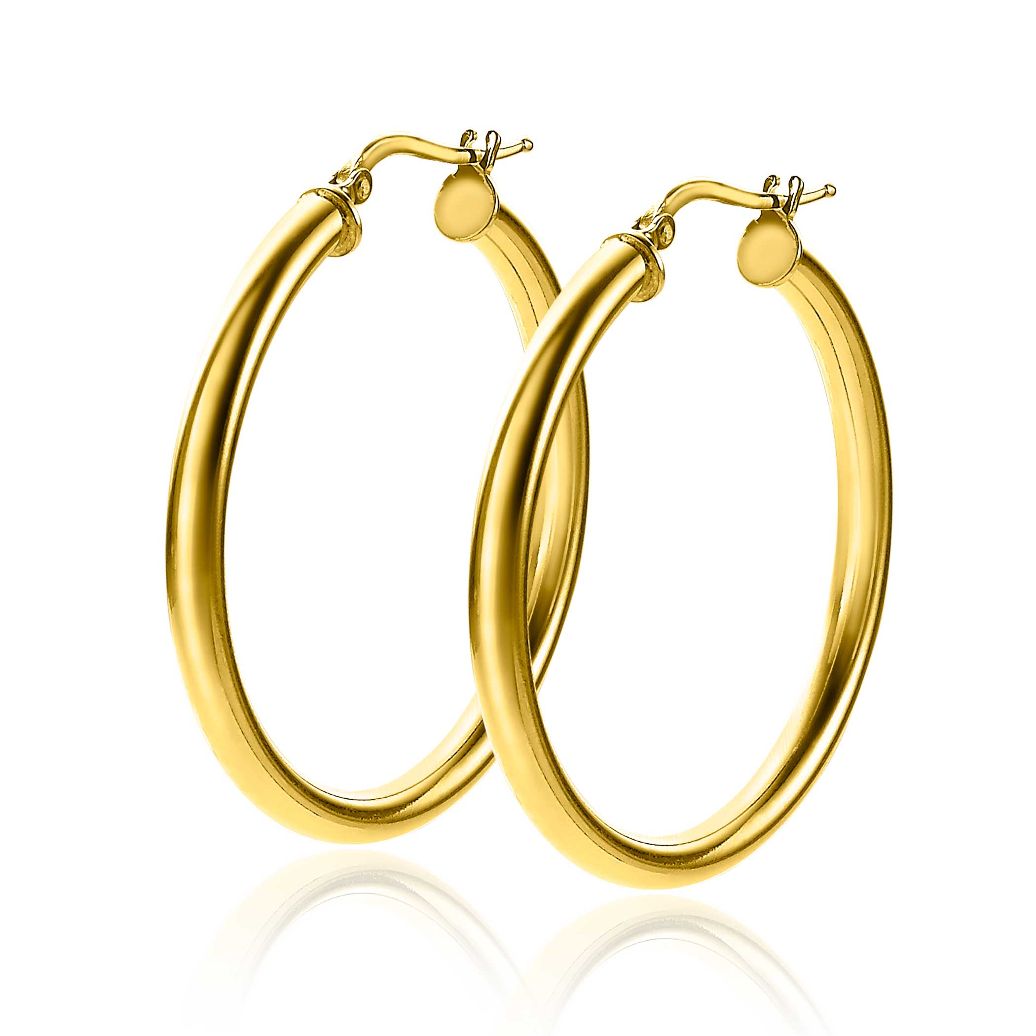 ZINZI zilveren oorringen 14K geel verguld in gladde, ronde vorm. De oorringen zijn 36mm in doorsnede en 3mm breed. Met gemakkelijke bovensluiting. Deze charmante oorringen blinken uit in hun eenvoud. Vervaardigd van eerste gehalte zilver (925) en extra 14K geel verguld.