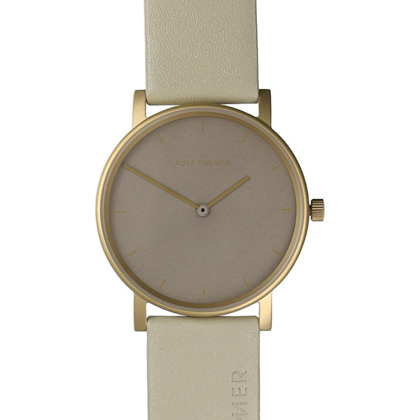 De Rolf Cremer horloge Pur is een stijlvol polshorloge met een roestvrijstalen kast en een crème kleurige band. Dit elegante horloge heeft geen datumfunctie, wat zorgt voor een minimalistische uitstraling. Dit horloge draag je het beste bij zowel formele als informele outfits, en het voegt een vleugje verfijning toe aan je look.