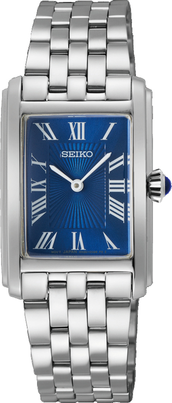 Dit is een dameshorloge van het merk Seiko. Het is een analoog horloge gemaakt van staal. De diameter van de kast is 22.2 mm en de kast is 7.18 mm dik.
De verdere specificaties van het horloge zijn als volgt:
Kastvorm: tonneau
Kastkleur: zilverkleurig
Kastmateriaal: staal
Bandbreedte: 16 mm
Bandlengte: 212.2 mm
Sluiting: vouwsluiting met drukker
Wijzerplaatkleur: blauw
Glassoort: hardlex mineraal glas
Waterdichtheid: 5 ATM
Techniek: quartz