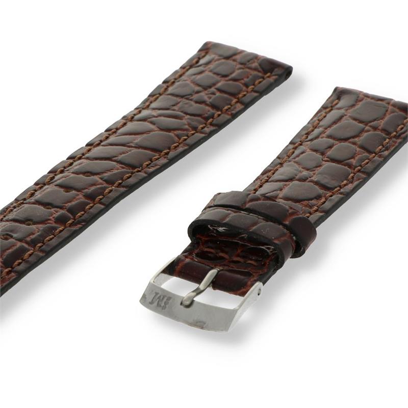Het Morellato Horlogeband Liverpool model PMD034LIVERP14 is een stijlvol en klassiek horlogebandje, gemaakt van echt leer met een krokodillenprint. Het heeft een donkerbruine kleur en een standaard model. Met een breedte van 14 mm past het perfect bij horloges met een vergelijkbare aansluiting. Ideaal voor een tijdloze en chique uitstraling.