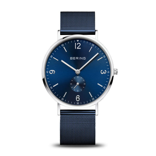 14040-307. Bering horloge. Blauwe milanese band. Stalen kast met een blauwe wijzerplaat. 