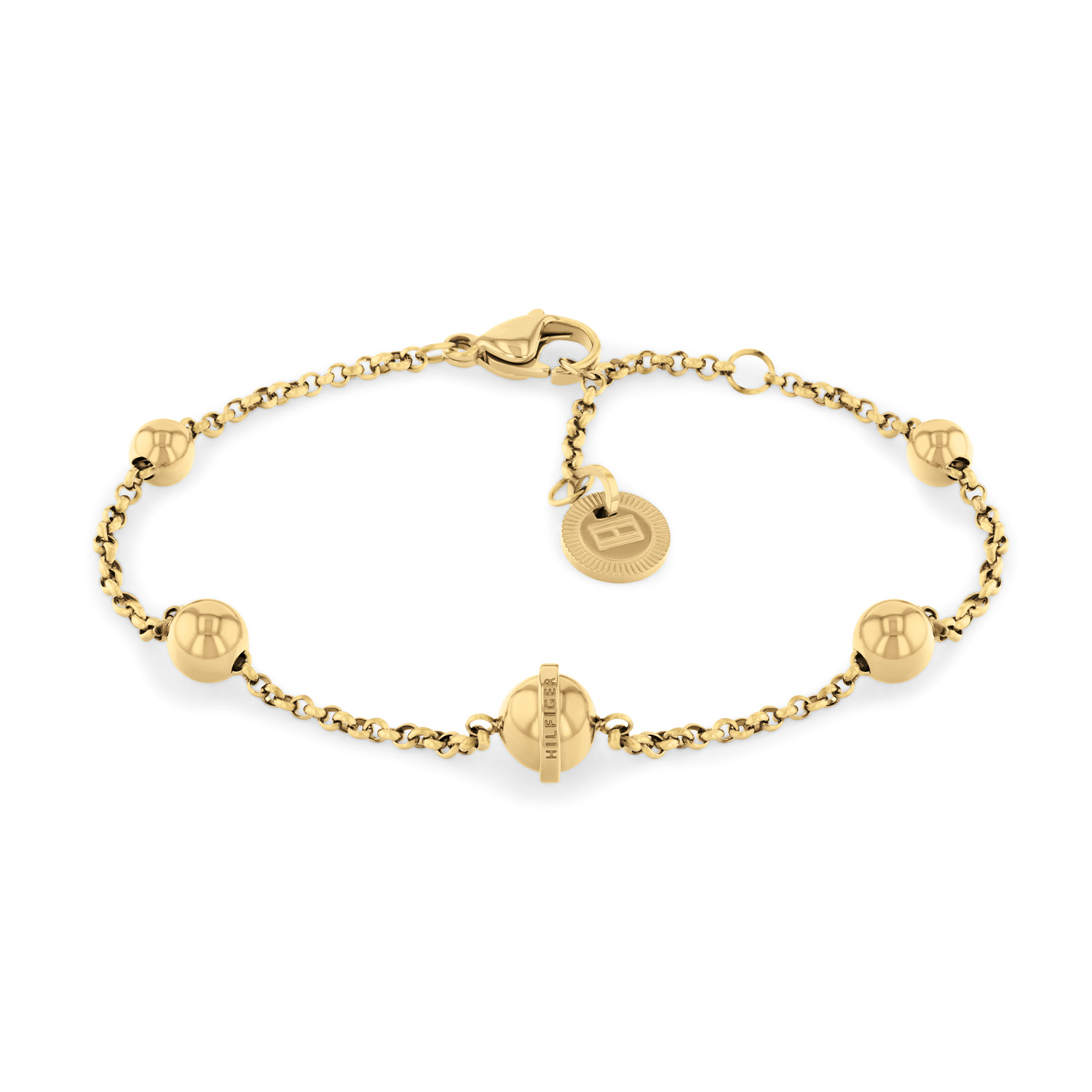 Tommy Hilfiger Jewels TJ2780815 Armband Dames 20cm
Deze armband van Tommy Hilfiger uit de jewelry serie met nr: TJ2780815 is een speels model. De goudkleurige stalen schakelarmband heeft meerdere bolletjes van verschillende grootte over de armband verdeeld. De dames armband heeft een karabijnsluiting en is op verschillende lengtes te dragen door de extra tussenogen. De totale lengte is 20cm. Leuk te combineren met de bijpassende oorknoppen en ketting van Tommy Hilfiger.

Het merk:
Tommy Hilfiger is wereldwijd één van de grootste designer lifestyle merken en is internationaal bekend om haar classic American cool stijl. De sieraden zijn voor dames en heren met een eigen stijl, die niet bang zijn om dit aan de wereld te laten zien.

Specificaties:
- Artikelnr: TJ2780815
- Armband
- Materiaal: Goudkleurig staal
- Lengte: 20cm
- Dames sieraad