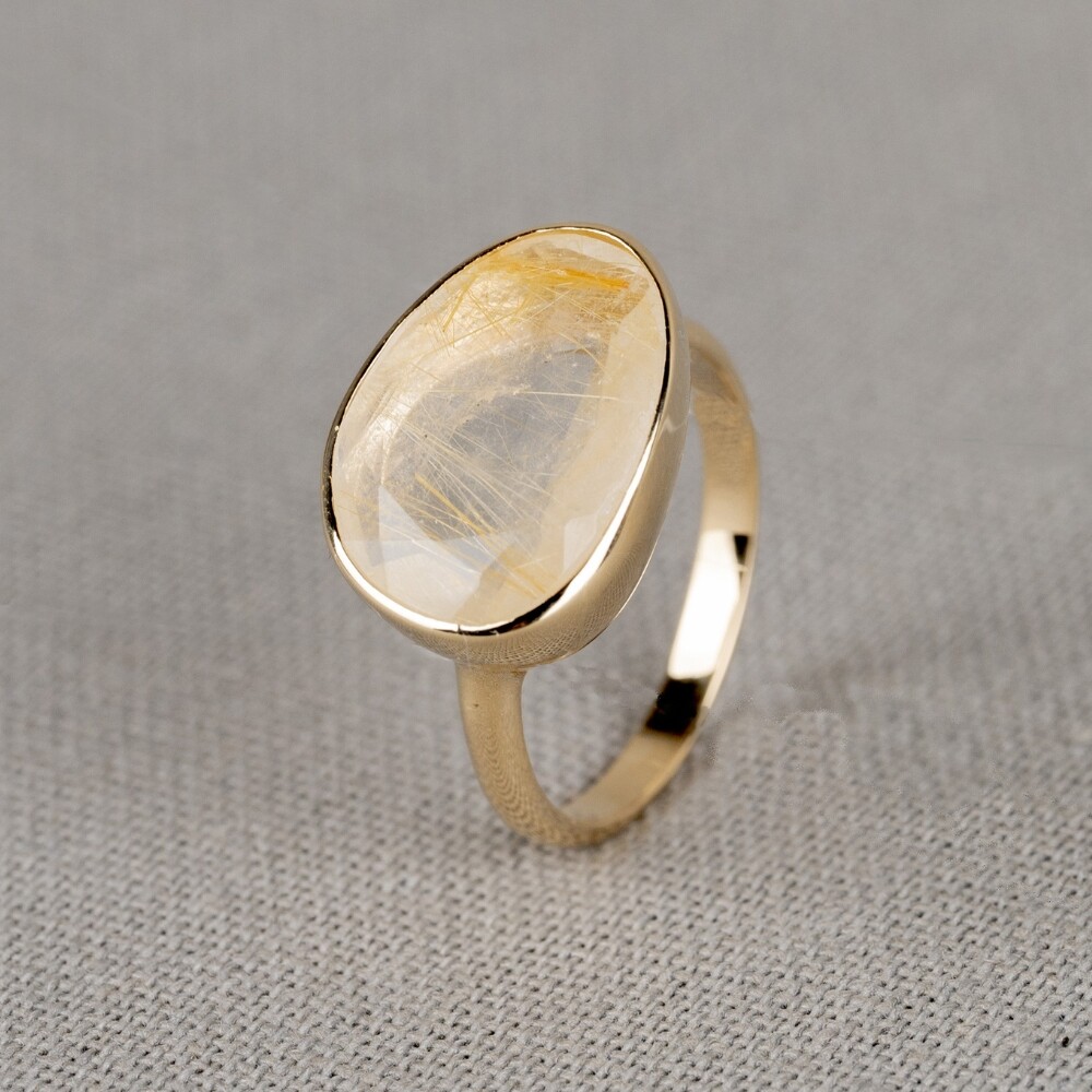 Ring gemaakt van 14 karaat goud in combinatie met de edelsteen Gold Rutiel. Combineer deze ring met de andere gouden sieraden uit de Rocky-lijn.