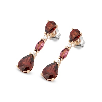 IRIS

EARRING 18KT.GOLD
Gold 3.80 Gr
DM 0.08 Kt
Tormaline 0.90 Kt
garnet 5.95 Kt