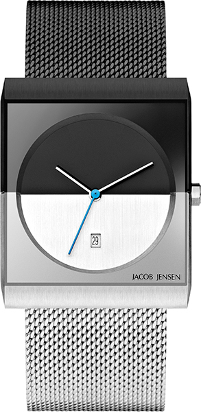 De horloges uit de Classic collectie van Jacob Jensen hebben de iconische tweekleurige wijzerplaat, die zo typisch is voor het design van Jacob Jensen. Extra designelementen van de uniseks Classic 515 zijn de zeshoekige kroon en de wijzers die bestaan uit twee lagen: een matte onderlaag en een zwarte bovenlaag. Design met een functie, want de kroon is zo beter te bedienen en de wijzers makkelijker af te lezen.

De Classic 515 heeft een zwarte stalen en een mat stalen helft, die bij elkaar komen in het midden van de wijzerplaat. De horlogeband is gemaakt van dun geweven staal (milanaise of mesh genoemd), ook hier van half zwart en half mat staal. De bandhelften worden gesloten door een clipsluiting die zelf te verstellen is.

Het 32 millimeter brede uniseks horloge heeft krasvast saffierglas en een betrouwbaar Zwitsers Ronda quartz uurwerk met datumaanduiding.