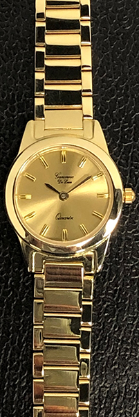 14 karaat gouden horloge met 14 karaat gouden horlogeband en saffierglas