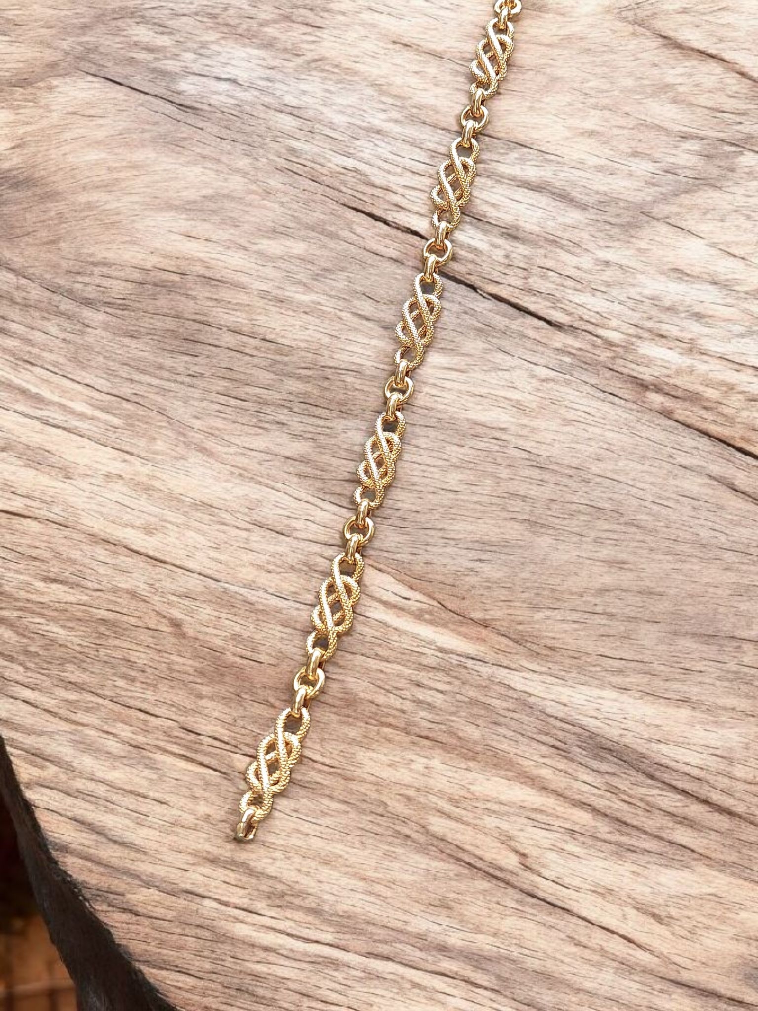 18kt gouden armband met gevlochten schakels. Occasion