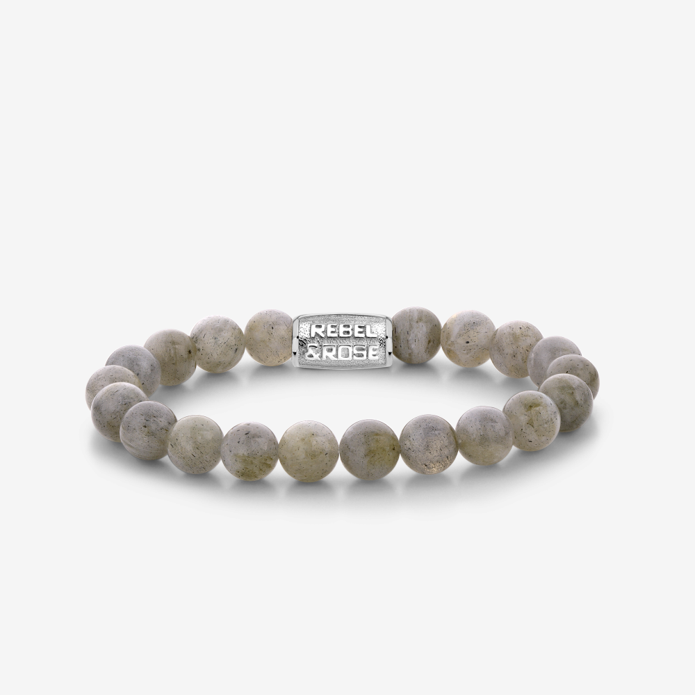 Deze prachtige Rebel & Rose Labradorite Shield Unisex armband, modelnummer RR-80122-S-L, is gemaakt met 8mm grijze kralen. De armband heeft een sieraadmaat van 190 mm en weegt 13,40 gram. Ideaal te dragen als stijlvol accessoire bij zowel casual als formele outfits. Perfect als statement stuk voor elke dag!
