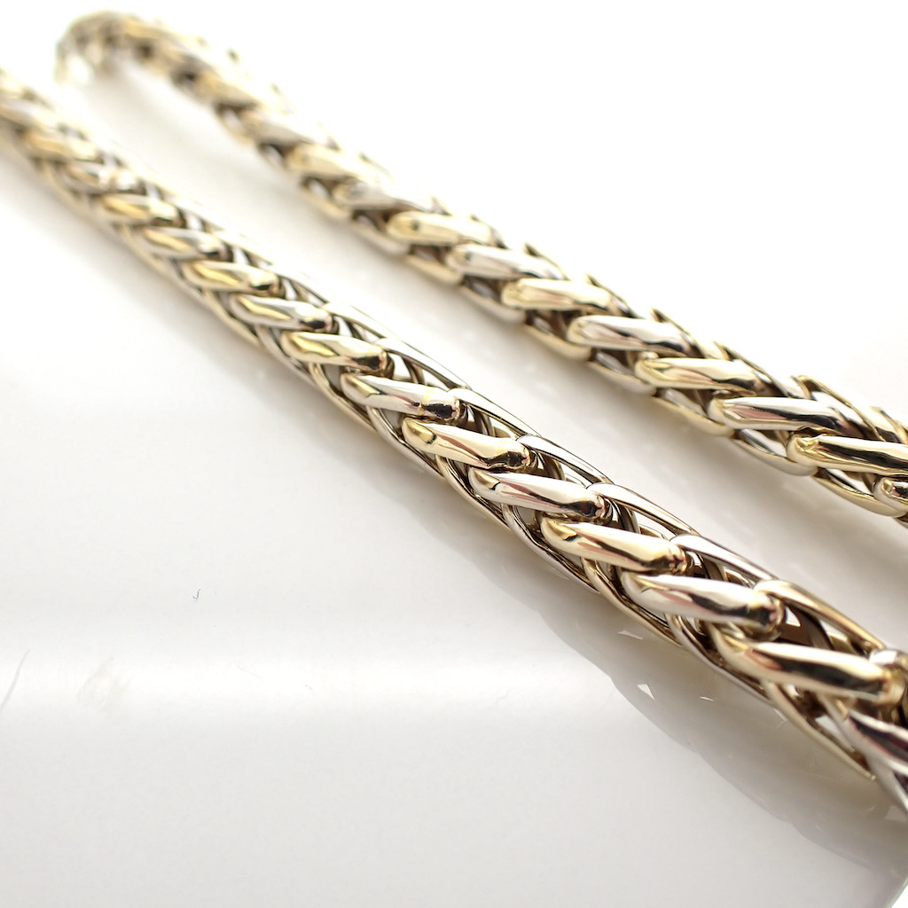 VIJL001 Bicolor gouden vossenstaart schakel armband. De vossenstaart schakel is een rond gevlochten ,geel en witgouden, draad. 5mm breed en 19,5 cm lengte