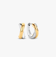 Oneindige liefde. Deze gold plated lus is verbonden met het zilver voor een cool contrast. Eenvoud op zijn best.