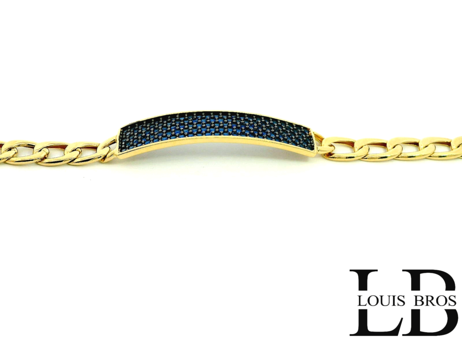 Deze verfijnde armband is vervaardigd uit 14 karaat geelgoud (4.5 gr) en straalt luxe en elegantie uit. Het middendeel is bezet met fonkelende blauwe zirkonia’s die prachtig contrasteren met het warme goud, wat zorgt voor een opvallende en stijlvolle uitstraling. De combinatie van klassieke schakels en het moderne accent van de edelstenen maakt deze armband tot een uniek en tijdloos sieraad.

Dankzij het unisex ontwerp is dit een perfect accessoire voor zowel dames als heren die houden van een subtiele touch van kleur en klasse.

Kenmerken:

Materiaal: 14 karaat geelgoud

Inzet: Blauwe zirkonia’s

Design: Tijdloos met een luxe twist

Geslacht: Unisex

Afwerking: Hoogglans gepolijst met fijne schakels