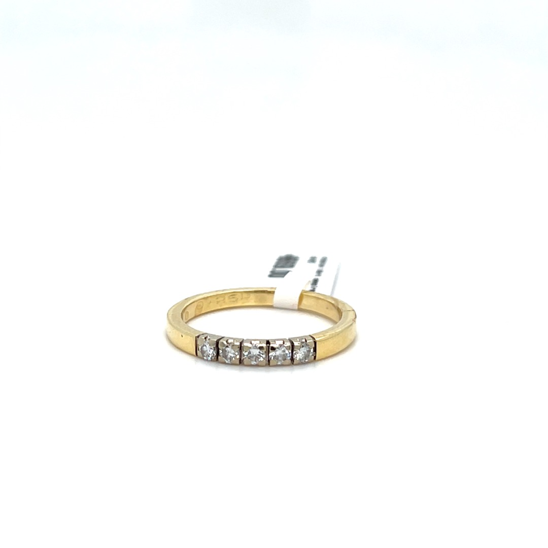 Occasion memoirering 14 karaat geelgoud met briljant in witgouden zetting 0.25ct