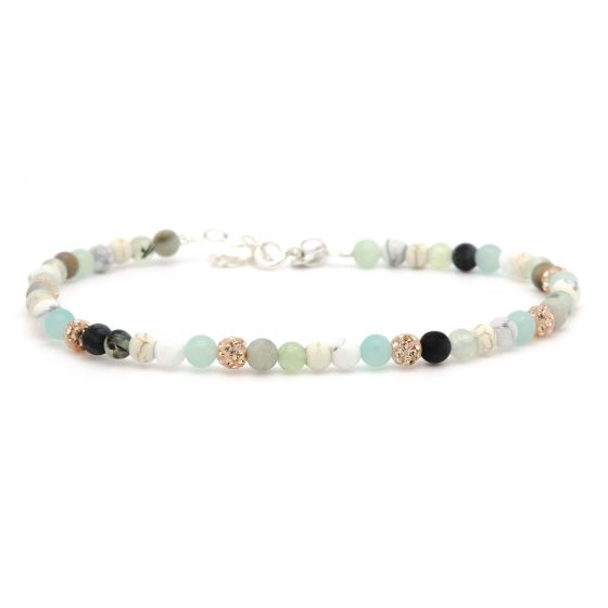 Dit is het Crystal Beads enkelbandje. Alle enkelbandjes met kristalkralen zijn 24 cm lang en de verstelbare bandjes zijn 4 cm. De kralen zijn van natuursteen, dus ze kunnen iets afwijken van de foto. Je kunt ze los dragen, maar het is ook een perfect enkelbandje om te combineren met onze enkelbandjes met schakels!