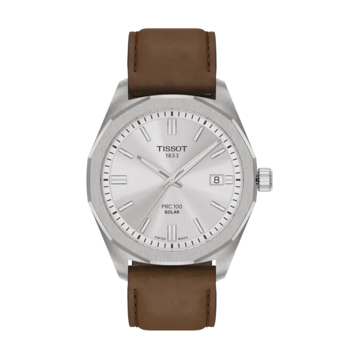 Een polshorloge Tissot model Solar met een zilver kleurige wijzerplaat en bruine band.