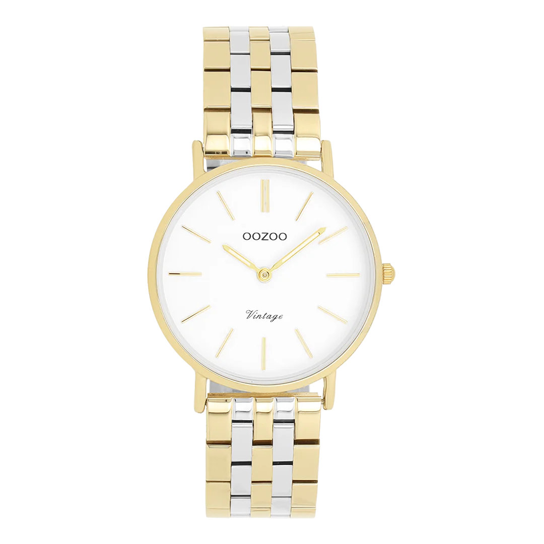 De Oozoo horloge model C20407, met goudkleurige kast en zilverkleurige/gouden roestvrijstalen band, heeft een analoge wijzerplaat met witte achtergrond en streepindexen. Nikkelvrij, zonder datum- en lichtfunctie, is dit ronde metalen horloge ideaal voor dagelijks gebruik. Draag het als een elegant accessoire voor zowel zakelijke als casual gelegenheden. Ideaal te combineren met goud- en zilverkleurige sieraden.