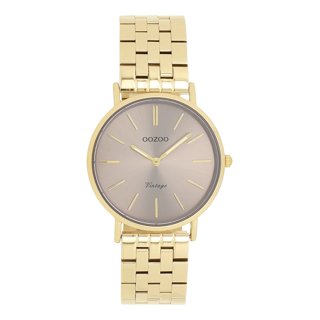 De Oozoo horloge C20408 heeft een goudkleurige, roestvrijstalen band en een taupe wijzerplaat. De ronde kast is gemaakt van metaal en is nikkelvrij. Het horloge heeft geen datumaanduiding of verlichtingsfunctie. De analoge wijzerplaat met streepjesindexen maakt het stijlvol en modern. Perfect te dragen bij zowel zakelijke als casual outfits.