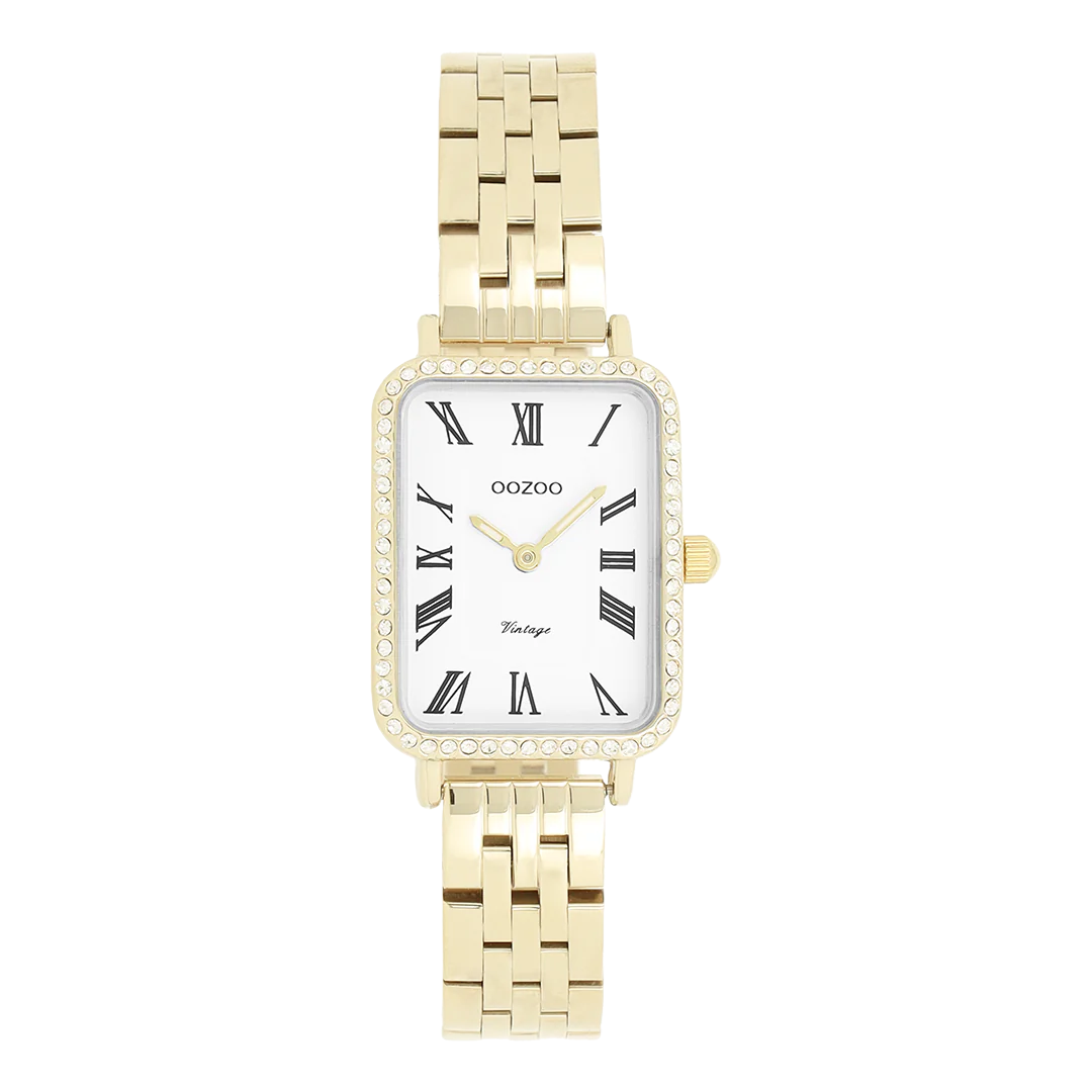 De Oozoo horloge C20414 is een stijlvolle polshorloge met een goudkleurige, rechthoekige kast en roestvrijstalen band. Het heeft een witte wijzerplaat met Romeinse cijfers en een analoge aanduiding. Dit nikkelvrije horloge bevat geen datum- of lichtfunctie. Draag het bij formele en dagelijkse outfits voor een verfijnde look. Perfect voor elke gelegenheid!