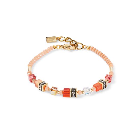 Stralende accenten voor je pols - de oranje Mini Cubes armband combineert lichtgevende Mini GeoCUBE®-elementen met Swarovski®-kristallen en fijne gouden accenten. Een subtiele maar effectieve kleuraccent voor je look.