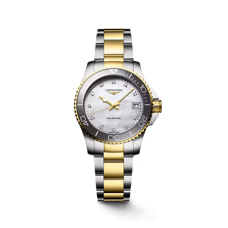 Dit Longines horloge behoort tot de HydroConquest collectie.
Referentienummer: L3.370.3.87.6

De Longines is voorzien van een kaliber L156 uurwerkr. De kast en band zijn gemaakt van roestvrij staal met rosegouden pvd coating. Het horloge heeft een diameter van 32 mm en is getest op een waterdichtheid van 30 ATM / 300 meter. Het horloge is dus perfect geschikt als duikershorloge. De band is gemaakt van roestvrij staal. Dankzij de Super- LumiNova op de wijzers en indexen is het horloge ook in het donker duidelijk af te lezen. Op de witte mother-of-pearl wijzerplaat schitteren 11 top-Wesselton VS-SI diamanten met een totaal van 0.044ct. Het horloge heeft een krasbestendig saffierglas met meerdere lagen anti-reflecterende coating aan beide zijden

