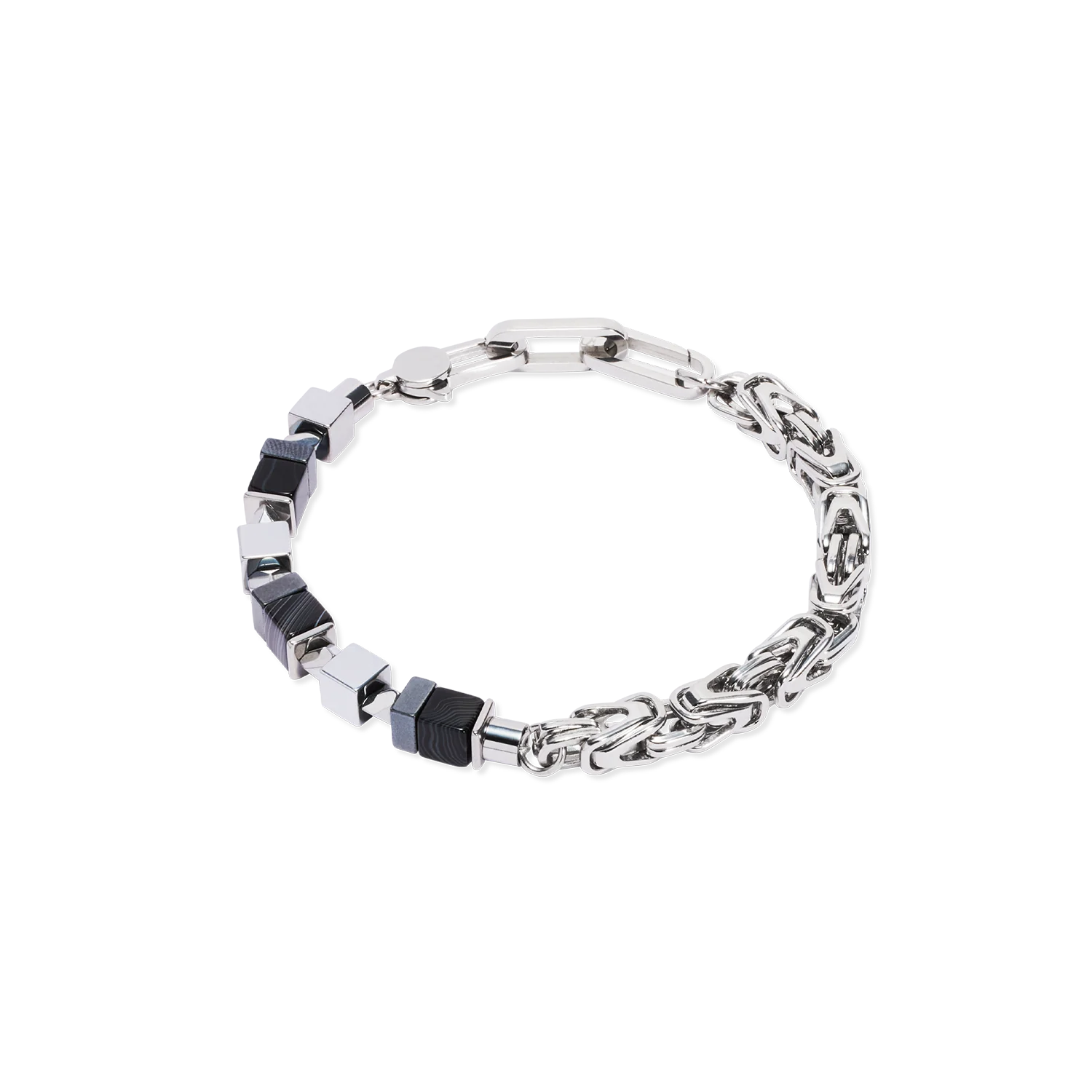 Eén armband, twee stijlen!
Eén kant met een vierkante koningsschakel en één kant met vierkante gestreept onyx en hematiet kralen.