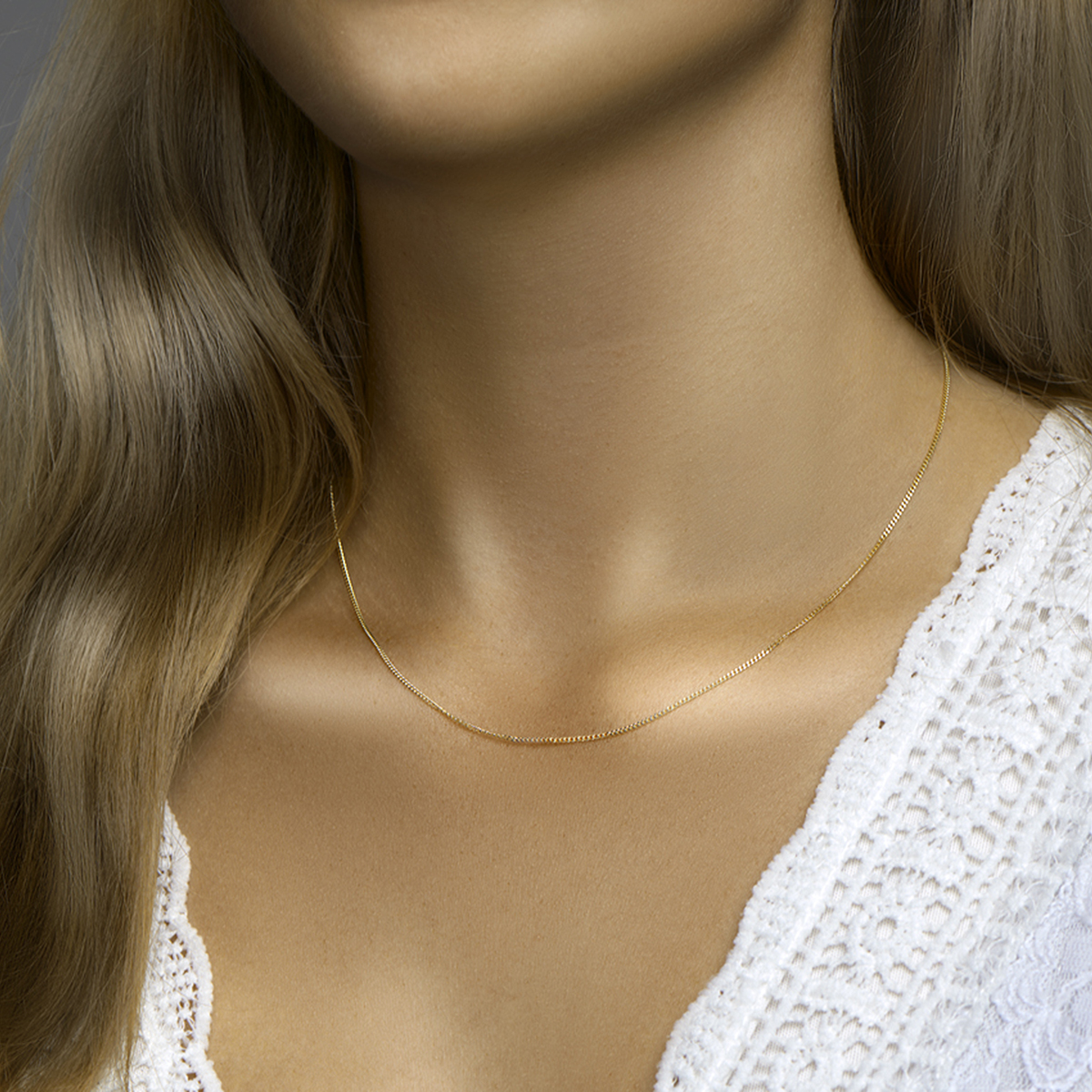 Verguld op 925 zilveren gourmette collier met een schakelbreedte van 1.2 mm. Geen garantie op plating.