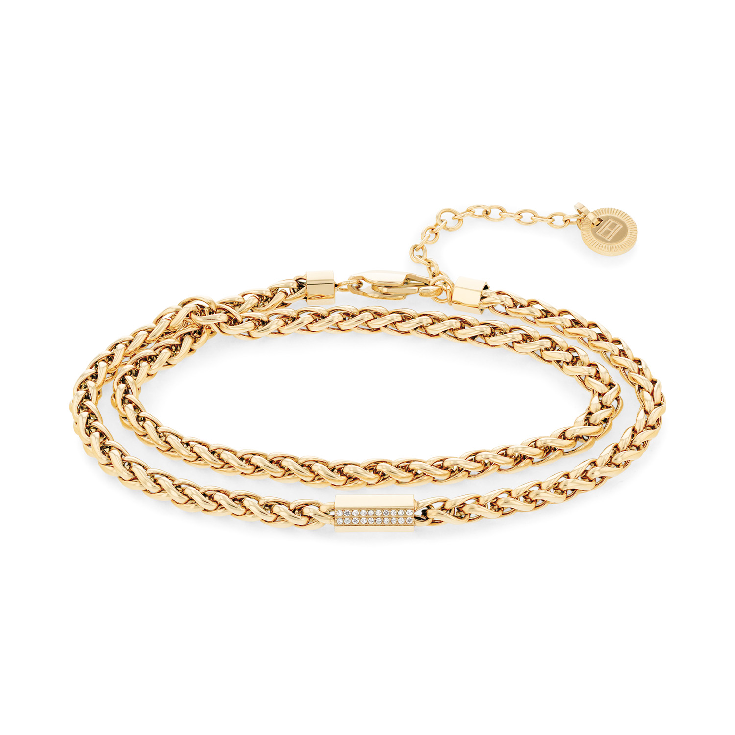 Tommy Hilfiger Jewels TJ2780876 Armband Dames Staal 
Deze armband van Tommy Hilfiger uit de jewelry serie met nr: TJ2780876 heeft een stoere uitstraling. De goudkleurige stalen vossenstaart schakelarmband is extra lang zodat je hem dubbel om de pols kan dragen. De dames armband heeft in het midden een tonnetje met kristallen erin. Door de extra tussenogen aan het verlengkettinkje kan hij op verschillende lengtes gedragen worden. De armband sluit met een karabijnslot en heeft een totale lengte van 38cm. Ook leuk te combineren met andere sieraden van Tommy Hilfiger.

Het merk:
Tommy Hilfiger is wereldwijd één van de grootste designer lifestyle merken en is internationaal bekend om haar classic American cool stijl. De sieraden zijn voor dames en heren met een eigen stijl, die niet bang zijn om dit aan de wereld te laten zien.

Specificaties:
- Wikkelarmband met kristallen
- Goudkleurig Staal
- Totale lengte 38cm
- Dames sieraad