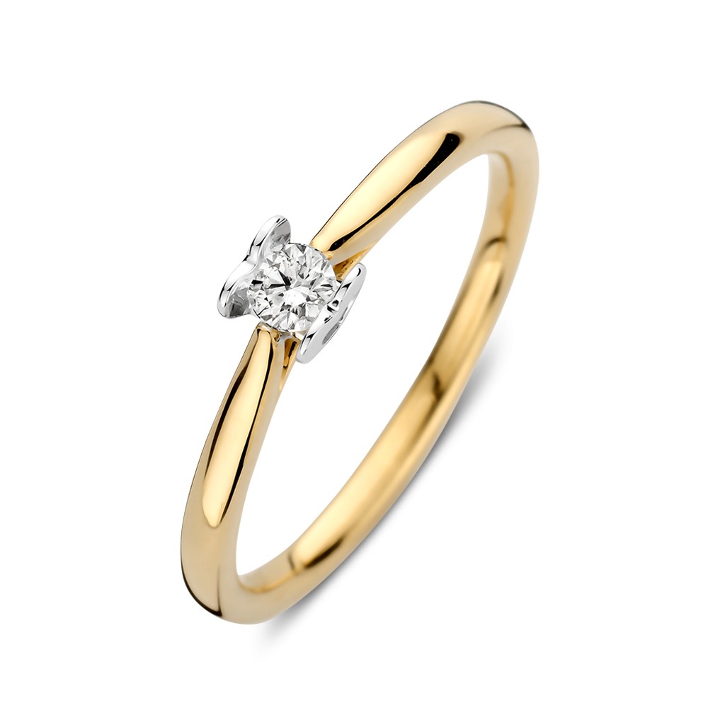 Bicolor wit- en geelgouden solitair ring met een diamant een bijzondere hartvormige zetting.
