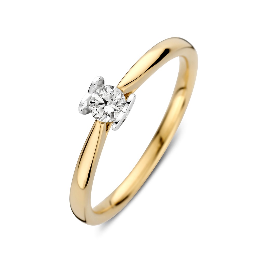 Bicolor wit- en geelgouden solitair ring met een diamant een bijzondere hartvormige zetting.
