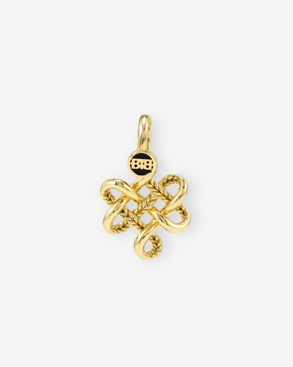 De Buddha to Buddha 665GV One - Endless Knot XS Hanger, modelnummer 001K09665E900, is een prachtige, nieuwe hanger gemaakt van verguld gerecycled 925 sterling zilver. Met zijn gewicht van 3,5 g, hoogte van 5 mm en breedte van 20,5 mm straalt het in goudkleur. Perfect te dragen aan een ketting voor een elegante dagelijkse look.