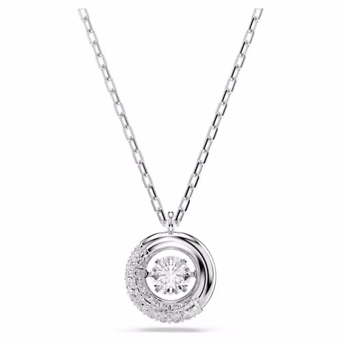 Deze fascinerende Dextera-hanger benadrukt de schoonheid van beweging. Dit verfijnde collier met karabijnsluiting heeft een rhodium toplaag en is voorzien van een centrale ring, die half is bezet met een pavé van heldere kristallen en een bewegende Swarovski Zirkonia in het midden. Combineer met een bijpassende set oorbellen voor een vreugdevolle, extravagante look.