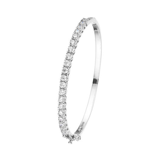 Zilveren gerodineerde bangle met 20 zirconia's in vierpootzetting, diameter 56mm. (slanke polsmaat).