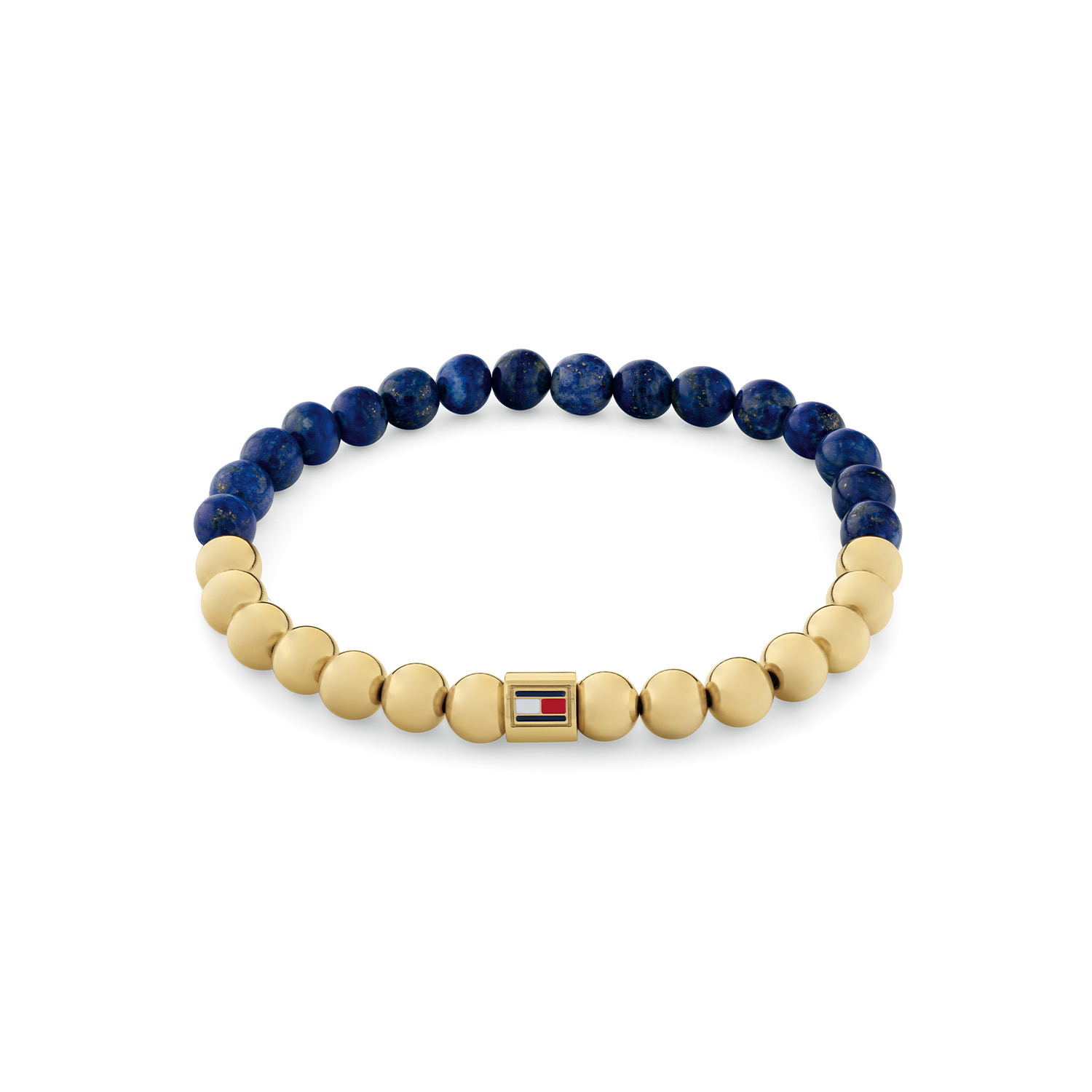 Tommy Hilfiger Jewels TJ2780963 Armband Dames Lapis GP 16,5cm
Deze armband van Tommy Hilfiger uit de jewelry serie Semi-Precious met nr: TJ2780963 is een fijn model. De dames armband is in 2 helften verdeeld met kralen. Een helft heeft goudkleurige kralen en de andere helft is Lapis. In het midden zit een stalen tonnetje met daarop het Tommy logo. De kralen zijn geregen op elastiek en past om een pols van ong 16,5cm. Ook leuk te combineren met de bijpassende oorbellen en andere sieraden van Tommy Hilfiger.

Het merk:
Tommy Hilfiger is wereldwijd één van de grootste designer lifestyle merken en is internationaal bekend om haar classic American cool stijl. De sieraden zijn voor dames en heren met een eigen stijl, die niet bang zijn om dit aan de wereld te laten zien.

Specificaties:
- Kralenarmband
- Materiaal: Staal GP en Onix
- Lengte 16,5cm op elastiek
- Dames sieraad