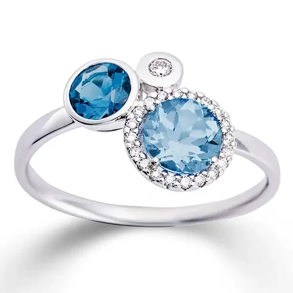 Prachtige wit gouden ring met 2 kleuren topaas en 0.09 ct. briljant in maat 56. 