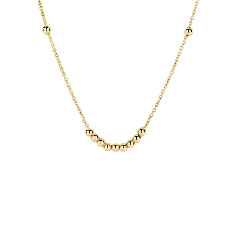 Gouden bolletjes en ankerschakels vormen samen het speelse design van dit 14k geelgouden collier. De lengte is 42 cm en het collier heeft een veerringsluiting. Draag het alleen of mix en match met andere colliers uit onze collectie voor een layeringeffect.
