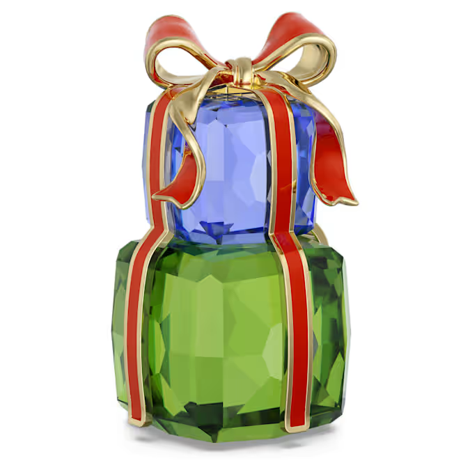 Dit vrolijke cadeaupakket is ideaal voor de feestdagen en viert de vreugde van het geven. Het ontwerp bestaat uit groene en blauwe pakketten, vervaardigd met 156 facetten, en bijeengebonden met een champagnegoudkleurig metalen lint met rode lak. Wonderschoon op zichzelf, en nog magischer naast de kerstman-, slee- of elfornamenten. Decoratieobject. Geen speelgoed. Niet geschikt voor kinderen jonger dan 15 jaar.