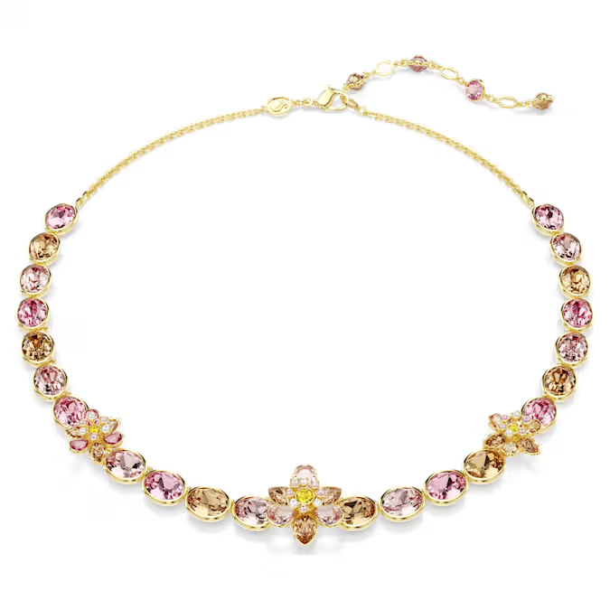 Deze all-around ketting straalt de vreugde van de natuur uit door een mix van warme kleuren en bloemmotieven. Het ontwerp met goudkleurige toplaag heeft een rij ovale kristallen in bezelzetting en is beeldschoon versierd met bloemen. Het is afgewerkt met een versierd verlengstuk voor een verstelbare pasvorm. Deze delicate creatie is een toonbeeld van de savoir-faire van Swarovski en past perfect bij andere sieraden uit dezelfde lijn.