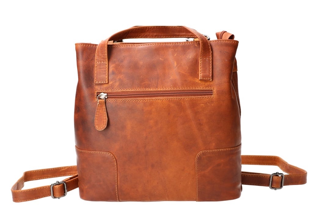 Stijlvolle shopper & rugtas in één – veilig, praktisch en karaktervol leer

Deze veelzijdige shopper/rugtas is de perfecte combinatie van mode en functionaliteit. Gemaakt van hoogwaardig, gewaxt leer dat met de tijd alleen maar mooier wordt – het krijgt een unieke, persoonlijke uitstraling naarmate je het gebruikt.

Dankzij de enkele toprits open je de tas gemakkelijk, waarna je toegang hebt tot twee ruime hoofdvakken, gescheiden door een tussencompartiment met ritssluiting. Zo houd je jouw spullen overzichtelijk en goed georganiseerd. Aan zowel de voor- als achterzijde bevindt zich een extra ritsvak voor snelle toegang tot je essentials.

Wat deze tas extra bijzonder maakt, is het slimme veiligheidsdesign: bij gebruik als rugtas vallen de banden kruislings over de rits, waardoor deze niet zomaar te openen is. Ideaal voor drukke plekken of tijdens het reizen.

Afmetingen:
Hoogte: 26 cm
Breedte: 26 cm
Diepte: 8 cm

✔️ Gemaakt van duurzaam, gewaxt leer
✔️ Shopper én rugtas in één
✔️ 2 hoofdvakken + tussenvak met rits
✔️ Extra ritsvakken aan voor- en achterzijde
✔️ Veilig: kruislings vallende banden bij dragen op de rug
✔️ Compact, maar verrassend ruim

Voor wie stijl, veiligheid en comfort wil combineren in één tas.