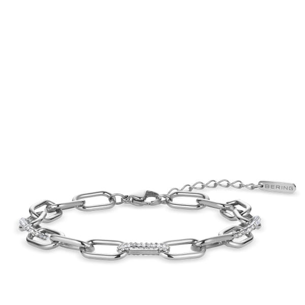  Een stijlvol armband uit de BERING Arctic Link collectie, waarin zilver­kleurige schakels worden gecombineerd met fonkelende witte kristallen. Het contrast tussen het glanzende metaal en de heldere stenen zorgt voor een modern en elegant geheel.  Perfect als statement, zowel solo gedragen als gecombineerd met andere sieraden uit de Arctic Link collectie. Een stijlvolle keuze voor elke dag en bijzondere momenten. 