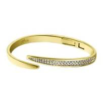 Lotus armband staal, goldplated . de armband heeft een scharnier aan de onderkant. de armband klemt om de pols.