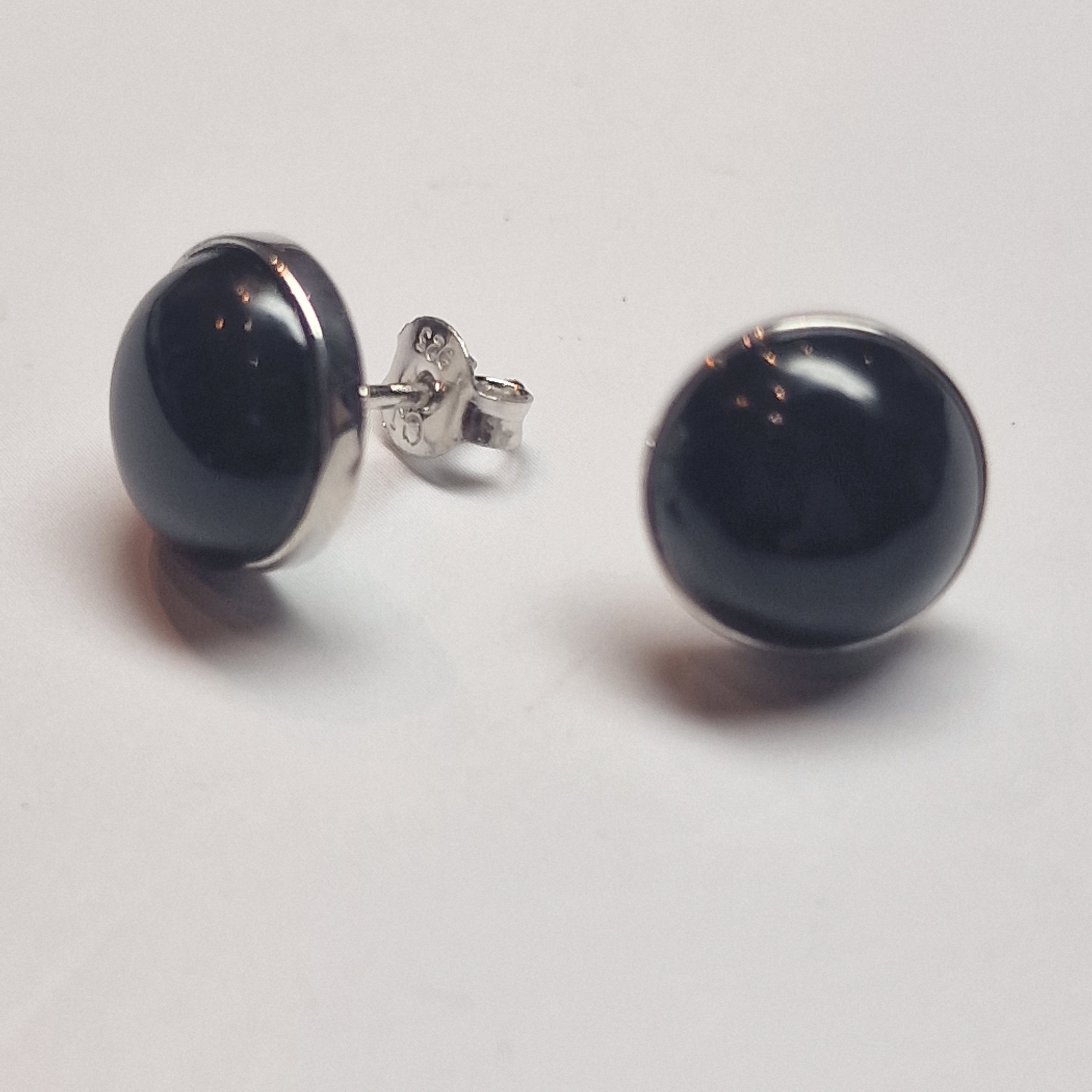 zilveren oorknop met Onyx