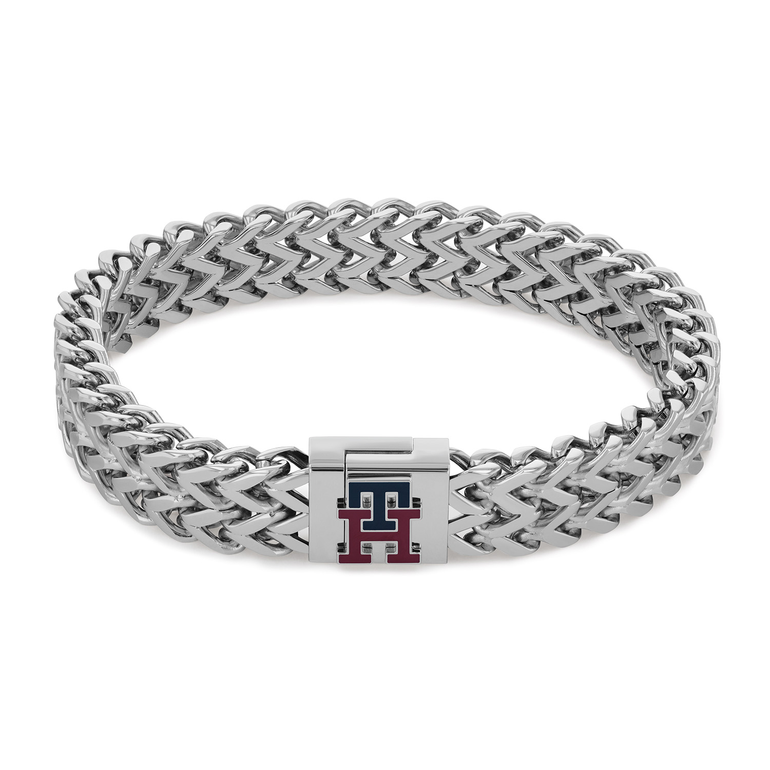 Tommy Hilfiger Jewels TJ2790462 Armband Heren Zilverkleurig 21cm
Deze unieke armband van Tommy Hilfiger van de jewelry serie met nr: TJ2790462 is een stoer model. De zilverkleurige heren armband heeft gevlochten schakels met een magneetsluiting met daarop een monogram van Tommy Hilfigen met zwart en rood emaille. De totale lengte is 21cm.

Het merk:
Tommy Hilfiger is wereldwijd &eacute;&eacute;n van de grootste designer lifestyle merken en is internationaal bekend om haar classic American cool stijl. De sieraden zijn voor dames en heren met een eigen stijl, die niet bang zijn om dit aan de wereld te laten zien.

Specificaties:
- Artikelnr: TJ2790465
- Zilverkleurige armband
- Materiaal: Staal
- Totale lengte 22cm
- Heren sieraad