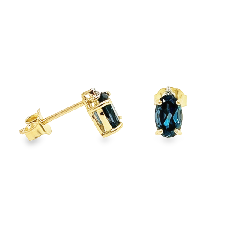 Gouden oorsteker met London Blue Topaas en diamanten