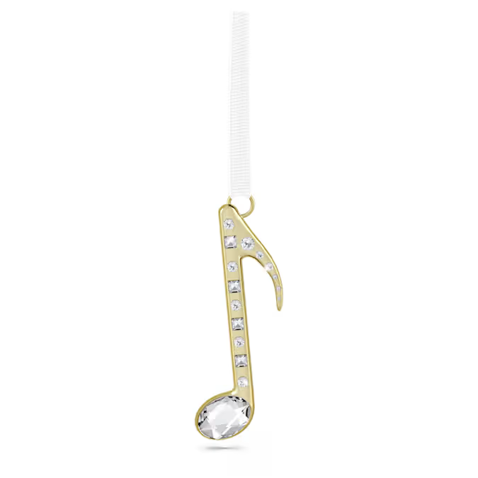 Creëer harmonie in uw feestdageninterieur met dit verfijnde ornament van een muzieknoot. De luxueuze ornament hangt aan een wit ripsband lint en is vervaardigd uit glanzend champagnegoudkleurig metaal en gedecoreerd met heldere kristallen aan beide zijden. Het geeft beeldschone lichtreflecties om het hele seizoen van te genieten. Het is een uniek cadeau voor iedereen die van vreugdevolle melodieën houdt. Decoratieobject. Geen speelgoed. Niet geschikt voor kinderen jonger dan 15 jaar.
