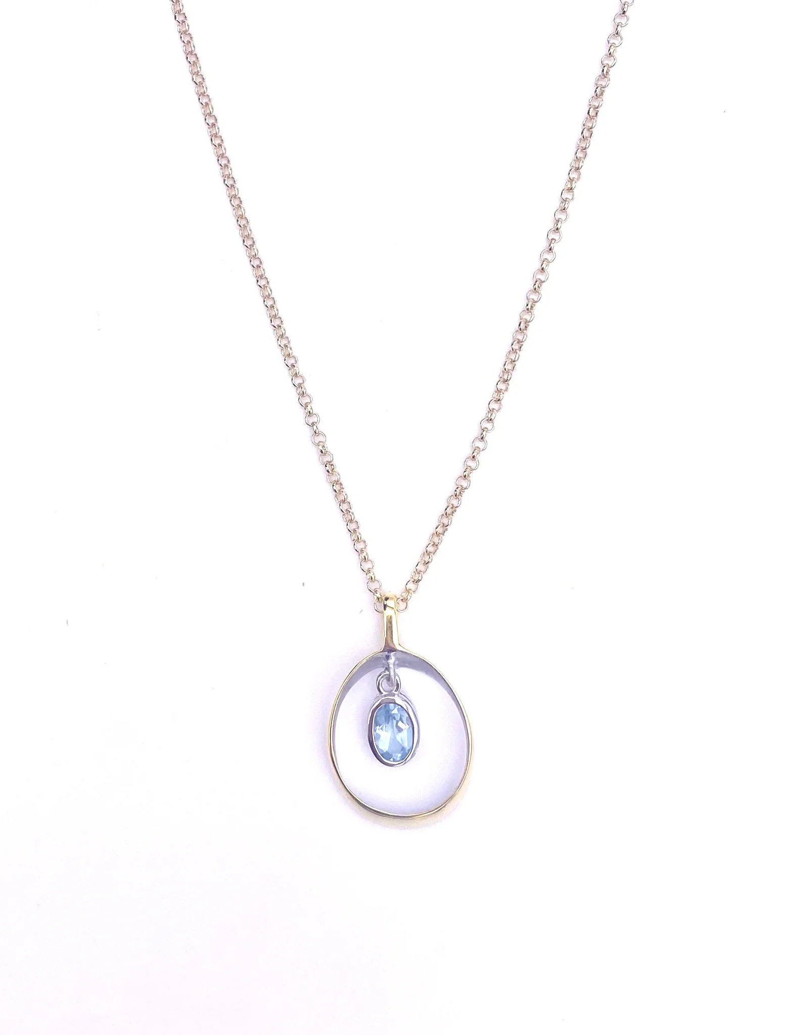 Jorge Revilla zilveren hanger met blauwe topaas