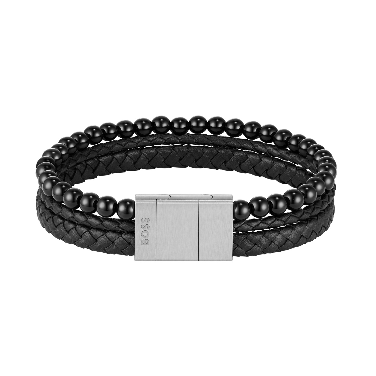 BOSS JEWELS HBJ1580786 SPHERE MIXED  Armband 19cm
Deze armband van BOSS uit de SPHERE MIXED serie met artikelnr. HBJ1580786 is een opvallend sieraad voor de echte BOSS klant. De armband heeft 2 zwarte leren gevlochten strengen en een onix kralen streng die samenkomen in een stalen sluiting. De aparte sluiting heeft een tussenschakel waarmee de armband kan worden ingekort. Dus deze is te dragen op 17,5 of 19cm. Zeker goed te combineren met de bijpassende sieraden van BOSS. 

Het merk:
HUGO BOSS is afgestemd op levensstijlen waar het gaat om kwaliteit en precisie. Het wereldwijde fashionlabel is verdeeld in twee merken: BOSS en HUGO. Het merk BOSS biedt geavanceerde, moderne horloges gericht op kwaliteit en design om een onberispelijke look te creëren – of het nu zakelijk, casual of sportief is. Ontdek de nieuwe horlogecollectie die bewijst dat details echt het verschil maken.

Specificaties:
- Artikelnr: HBJ1580786
- Armband met leer en Onix
- Materiaal slot: Staal
- Zwart
- Lengte: 17,5-19cm