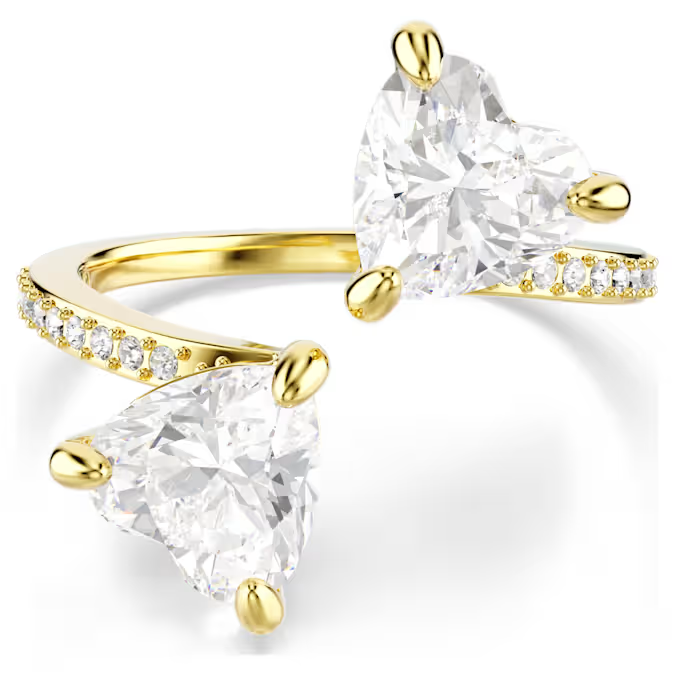 Deze Swarovski-ring met goudkleurige toplaag is ge&iuml;nspireerd op het idee van twee harten die elkaar ontmoeten. Een perfecte uiting van romantiek met twee fijn geslepen Swarovski Zirkonia die elkaar in het midden raken. De schittering van de harten wordt verder geaccentueerd door een eenvoudige maar elegante pav&eacute; band die rond de vinger loopt. De tijdloze symboliek maakt deze Swarovski-ring een perfect cadeau voor iemand van wie u houdt.