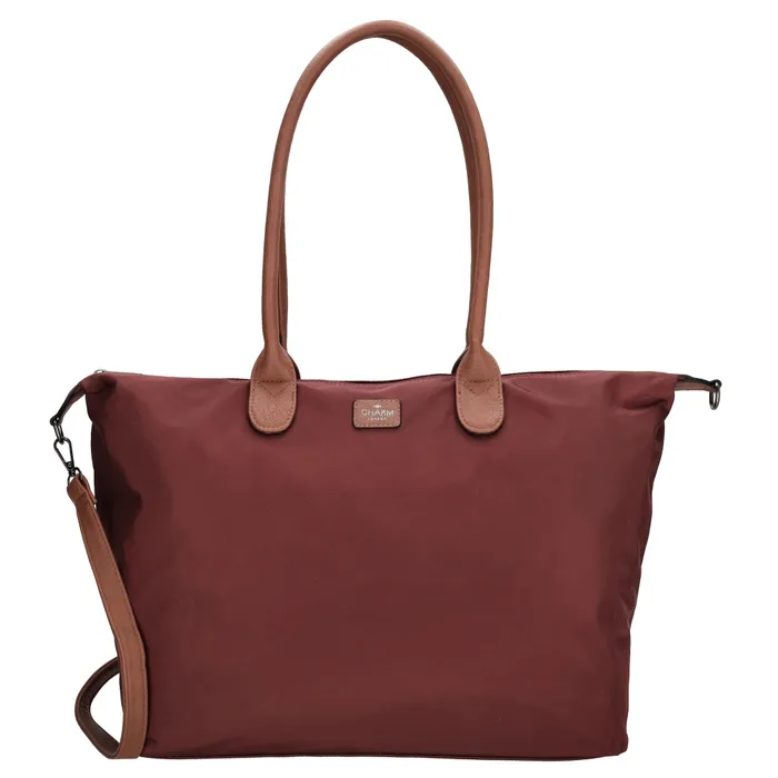 Deze shopper van Charm London is de perfecte tas voor school of werk. De tas biedt een ruim hoofdvak met een telefoonvak, ritsvak en speciaal laptopvak, geschikt voor laptops tot 15.6 inch. Aan de achterkant bevindt zich een extra ritsvak voor snelle toegang. Dankzij de verstelbare en afneembare schouderband kun je de tas eenvoudig crossbody dragen op jouw gewenste hoogte.

Kenmerken:
• Afsluitbaar met een rits
• Laptopvak geschikt voor 15.6 inch laptops
• Ritsvak aan de achterkant
• Afneembare en verstelbare schouderband
• Handig telefoonvak