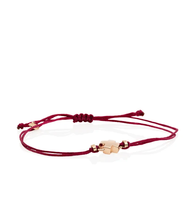 De Joy armband van Bron Jewelry is een elegant sieraad van 18 karaat roségoud met een subtiel kusje op een stijlvol koord. Een speelse en tijdloze toevoeging aan elke look. Het referentienummer is 8AR3981. 
