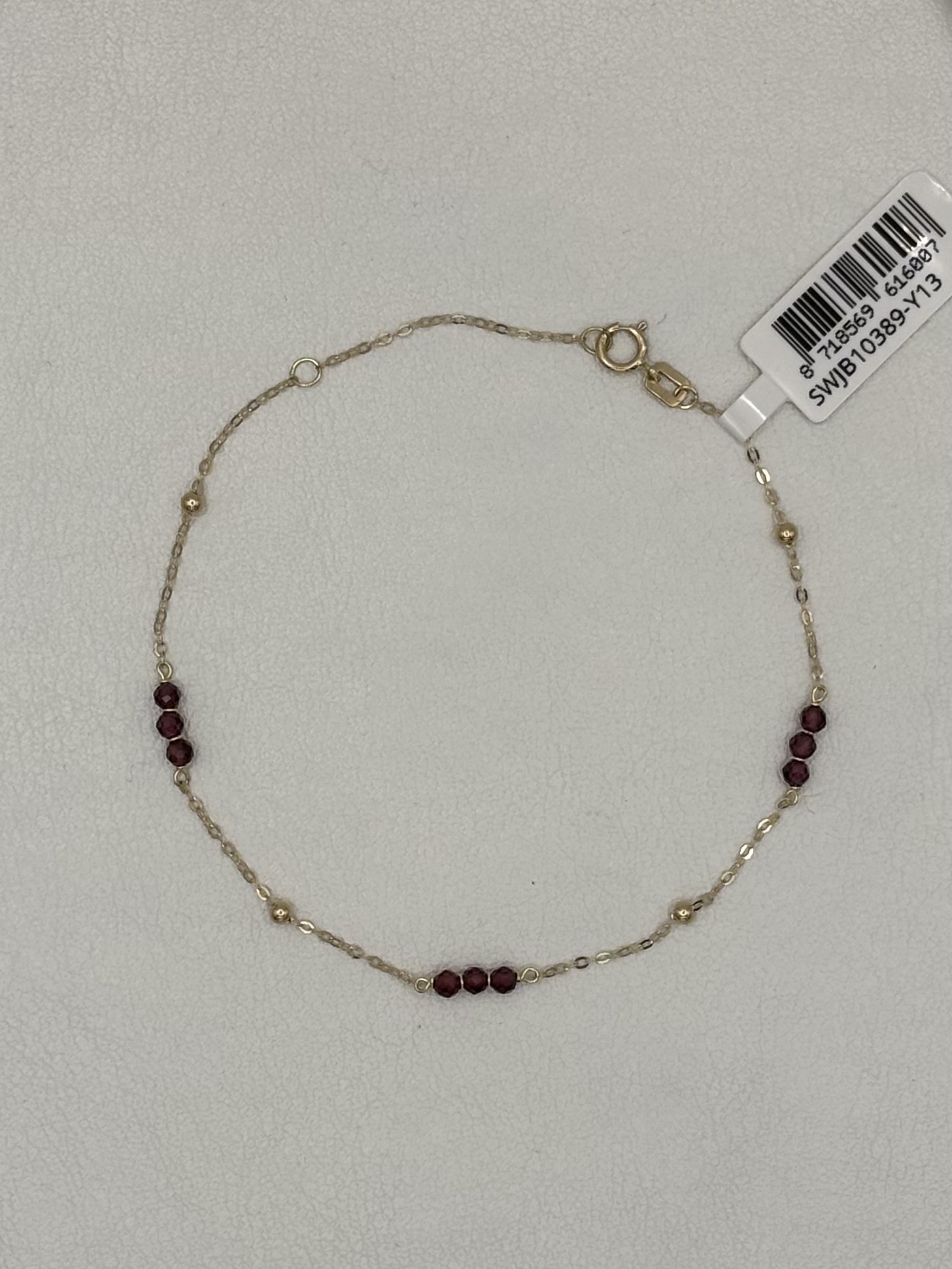 gouden Swing armband, 3x 3 granaatjes