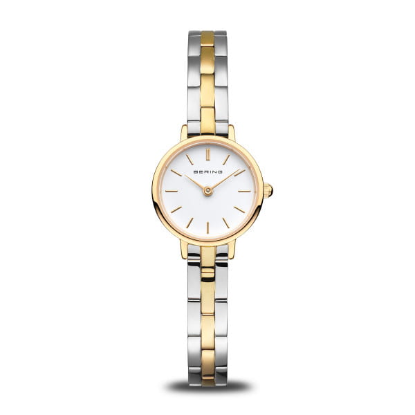 De BERING HORLOGE  is een elegant dameshorloge met een gouden ronde kast van roestvrij staal en een saffierglas. De zilverkleurige roestvrijstalen band zorgt voor een verfijnde look. Dit analoge en quartz horloge is hypoallergeen en heeft geen datumaanduiding. Waterdichtheidsniveau 3 is ideaal voor dagelijks gebruik. Draag het als een stijlvol accessoire voor elke gelegenheid.
